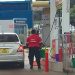A motorist gets to a petrol pump without queue in Blantyre yesterday