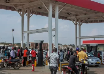 Motorists queue at a service station in Blantyre