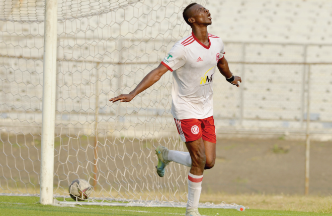Babatunde celebrates after scoring