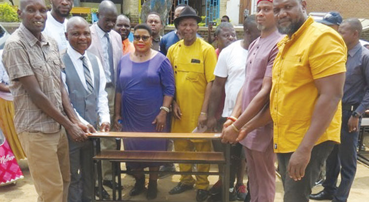 Nigerian community gives Mbayani Primary School desks