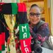 Kadango Malango displays her trophy