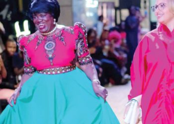 Professor Address Malata showcases her dress 
made by Lily Alfonso