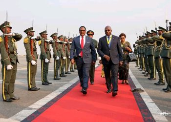 Chakwera inspects a guard of honour on arrival guided by Angola Minister of External Affairs Tete Antonio