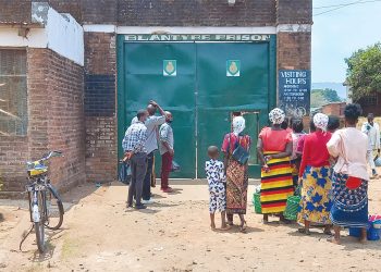 People queue outside Blantyre Prison