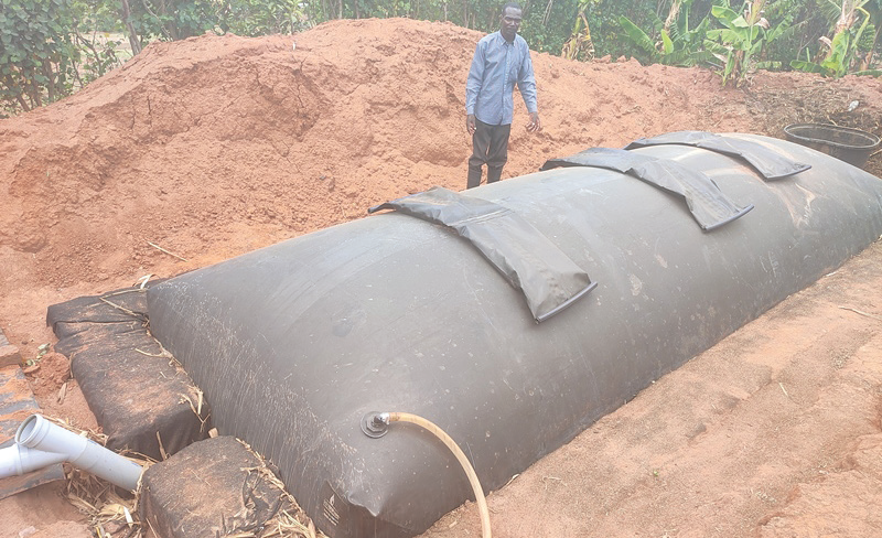 Jeffrey on the biogas digester