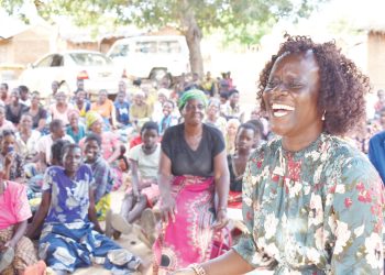 Katengeza interacts with locals during a community meeting in T/A Mduwa