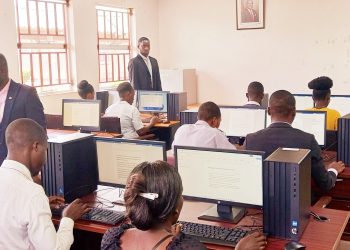 Student teachers at Phalombe TTC sample the new compueters donated by Macra