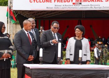 Chakwera, Vice-President Saulos Chilima and the First Lady light up the memorial candle during the prayers