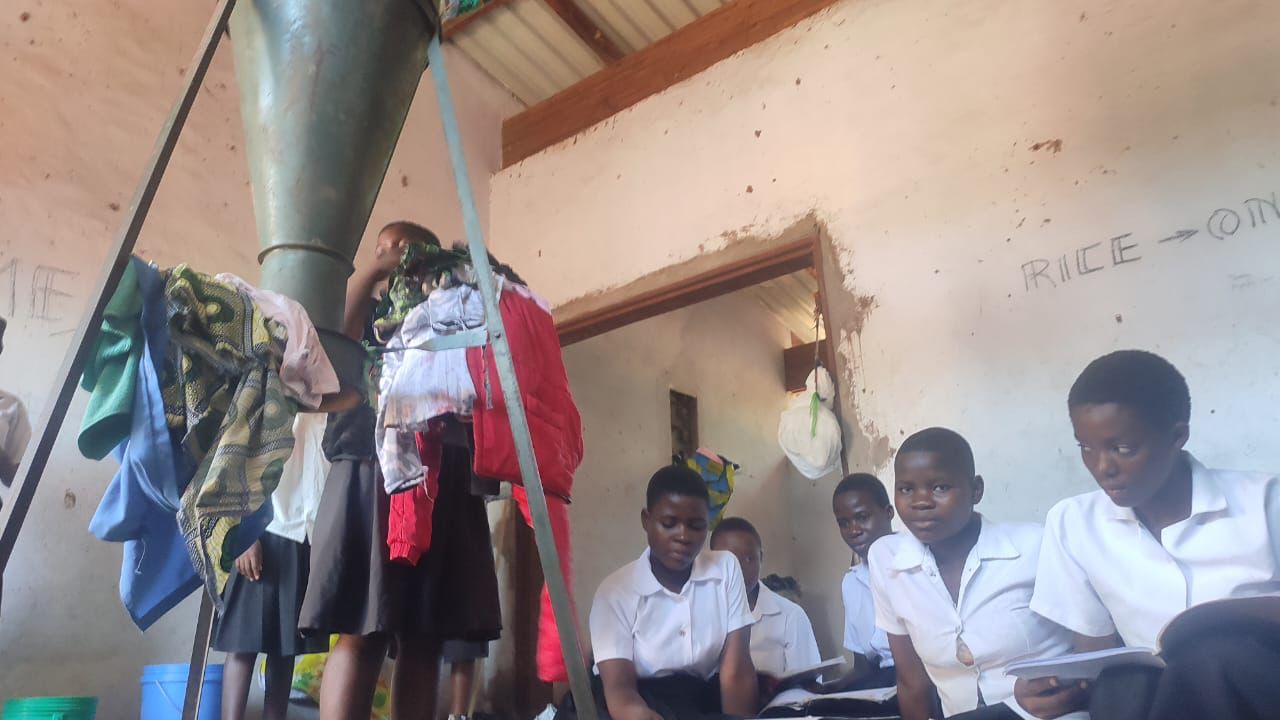 School girls sleep in maize mills